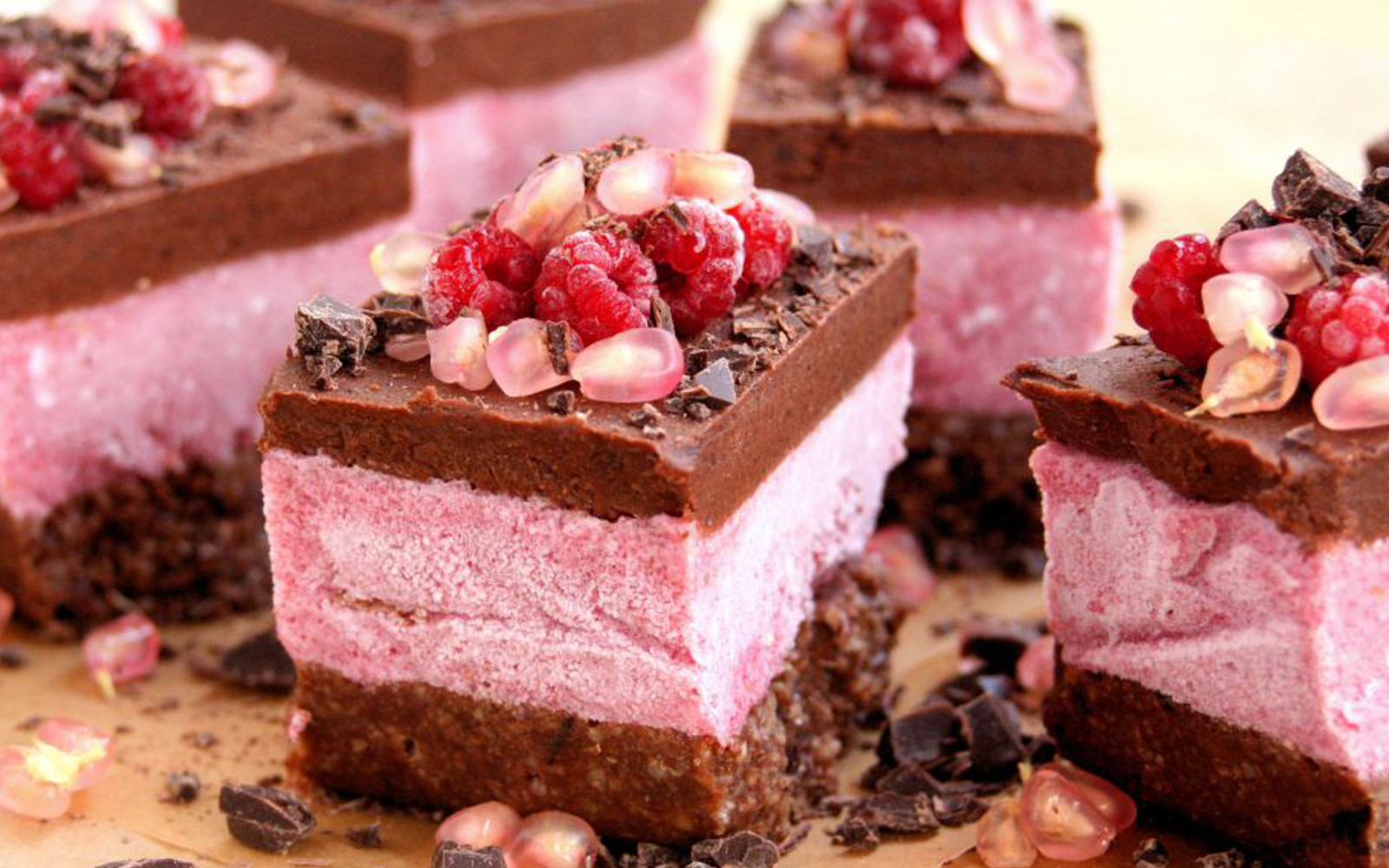 raw raspberry pomegranae cake slices