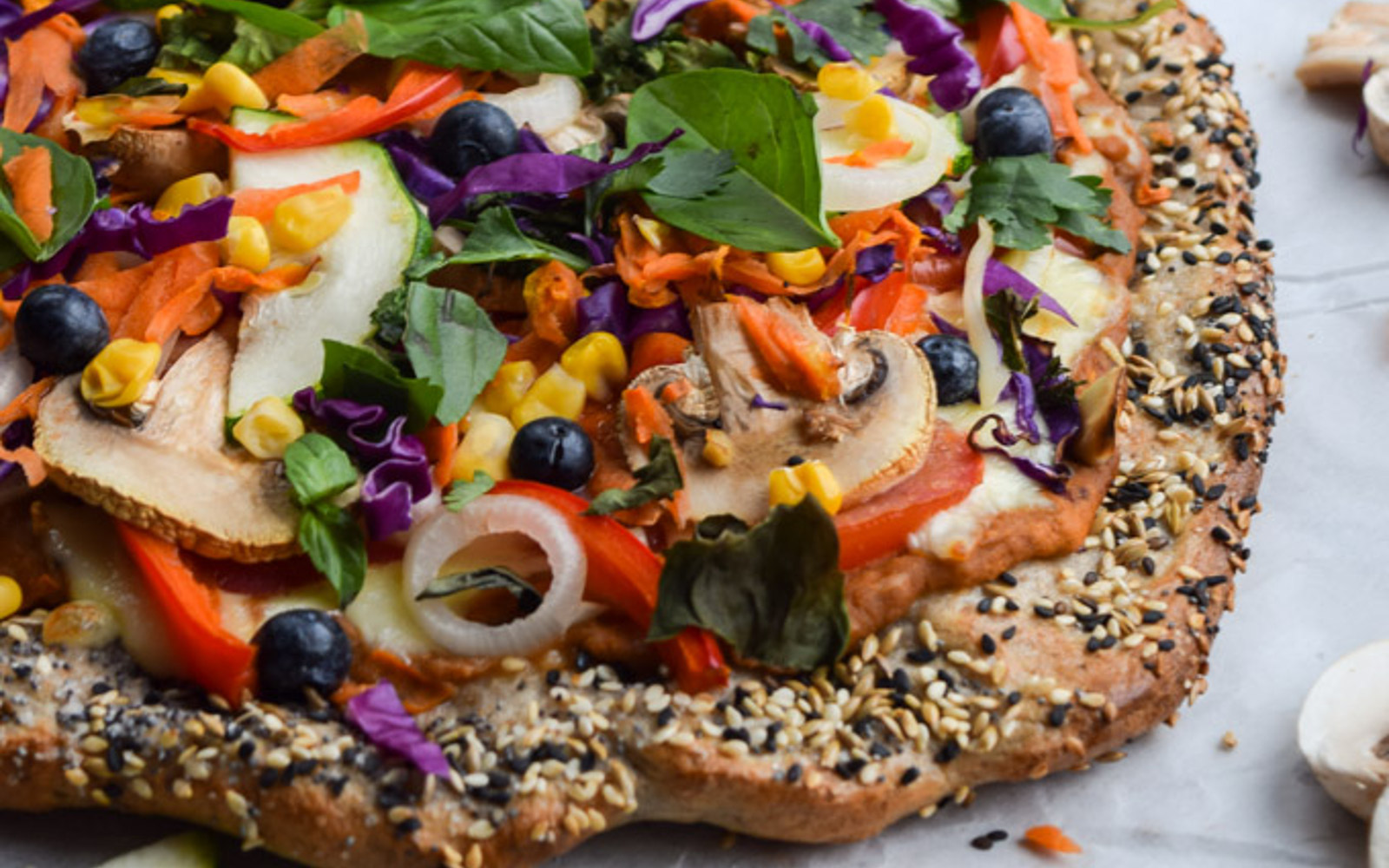 Rainbow Veggie and Hummus Pizza with Everything Bagel Crust