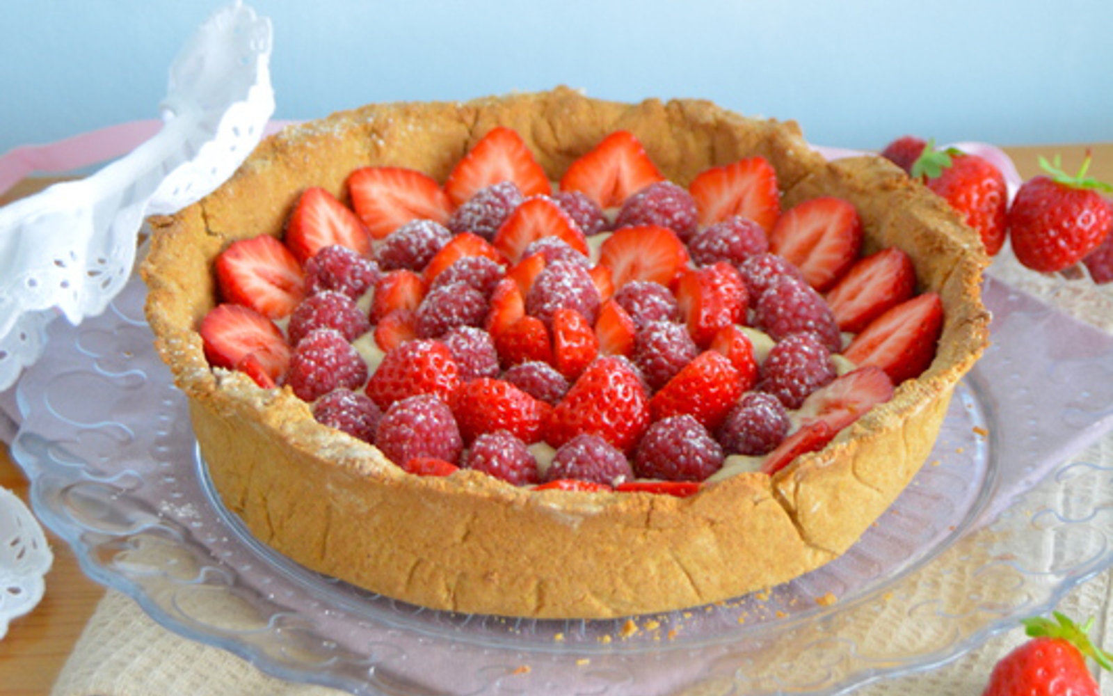 Vegan strawberry and raspberry tart with polenta crust
