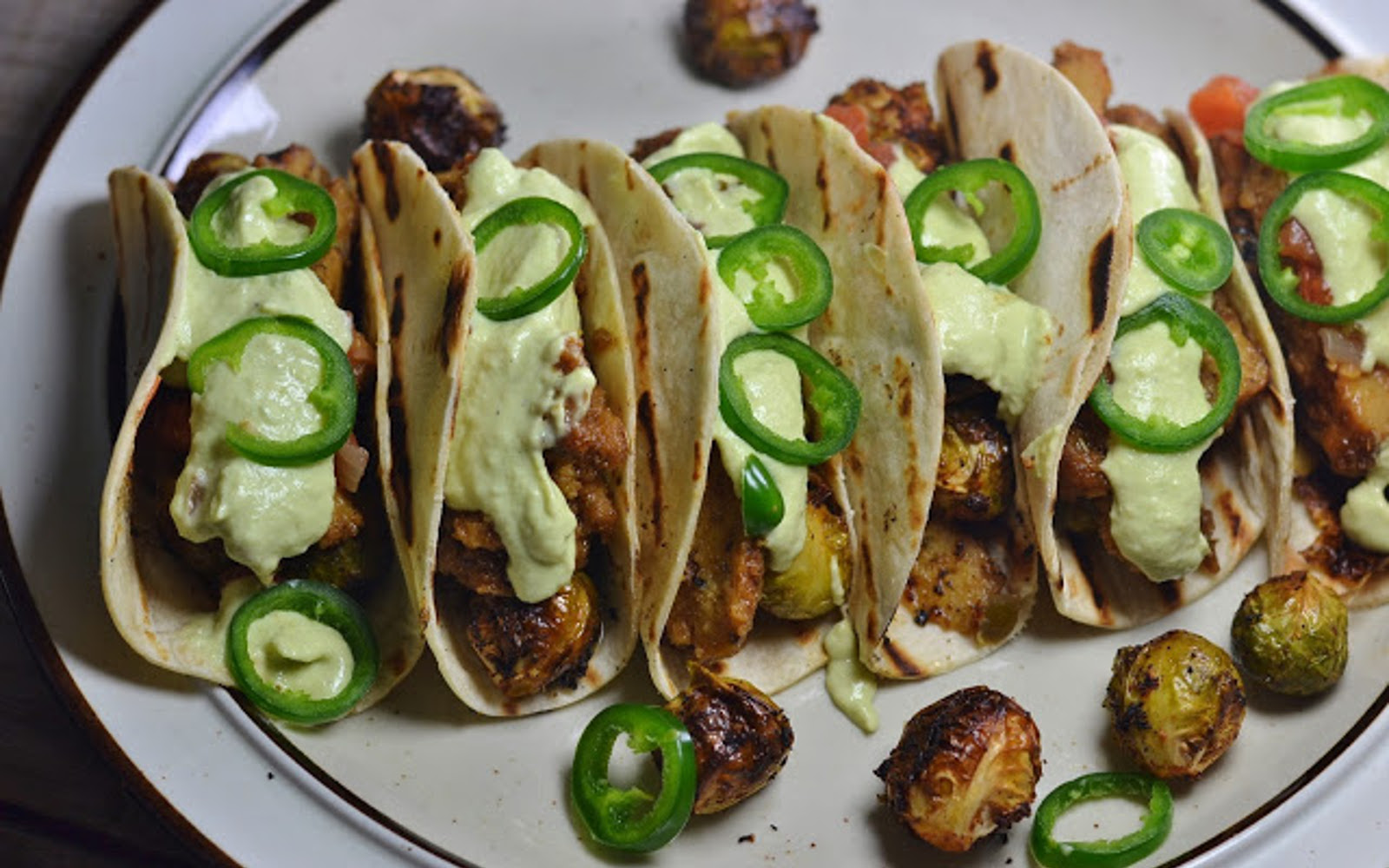 Vegan seitan tacos churrasco-style with roasted Brussels sprouts