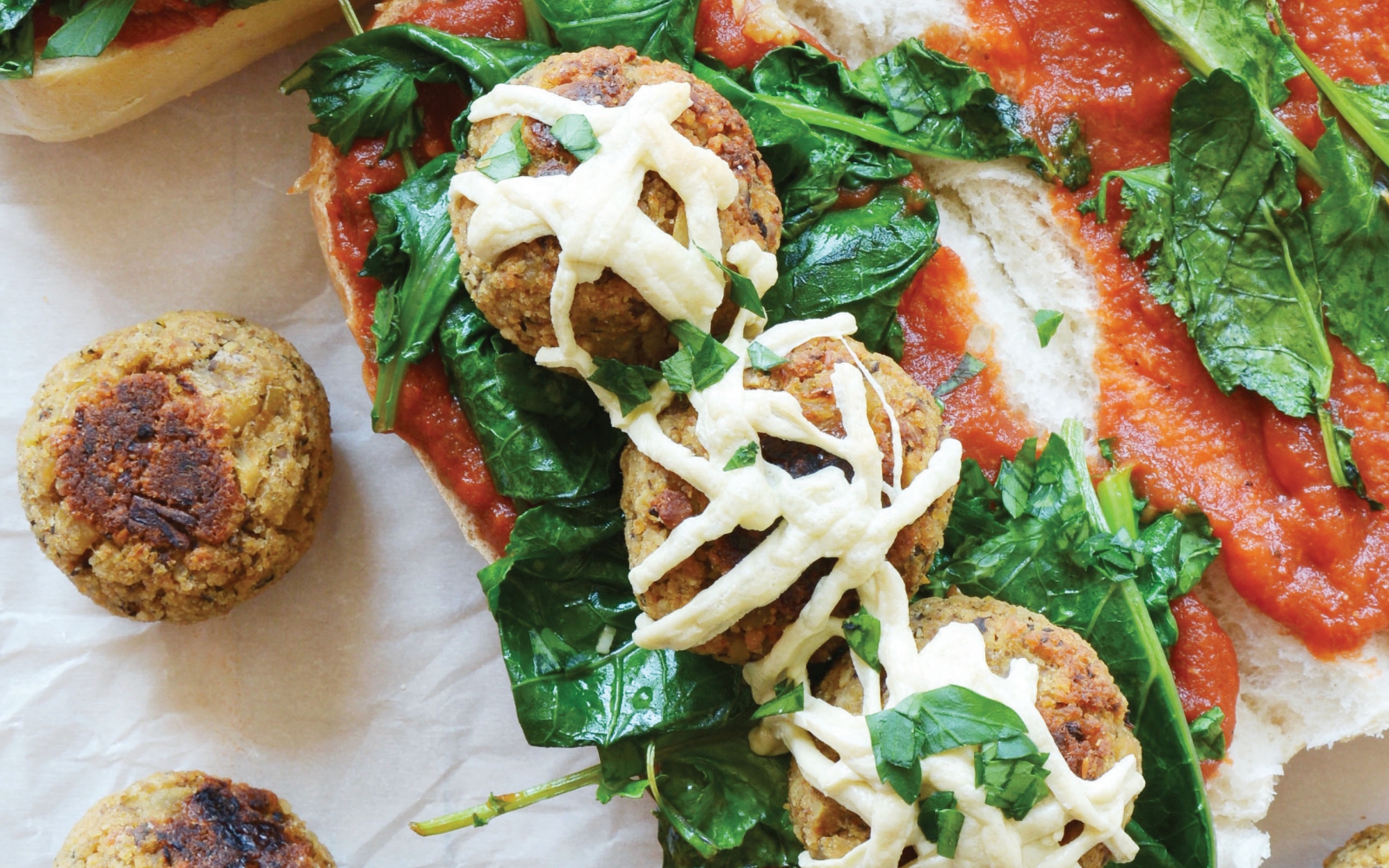 Plant-based meatball and garlicky greens sub