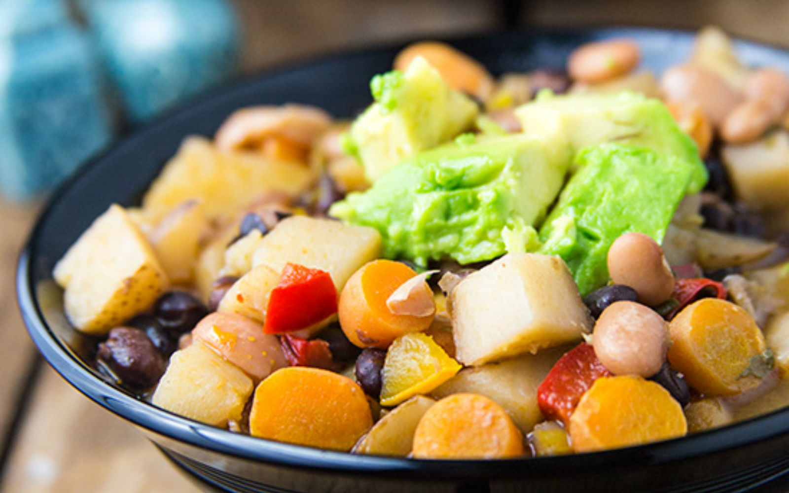 Vegan, Gluten-Free Quick Mexican Stew with Kale and Chipotle and chickpeas and avocado topping