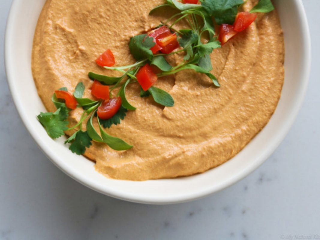 Red Pepper Cashew Queso Dip with Baked Tortilla Chips