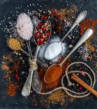 Spices and salt in spoons