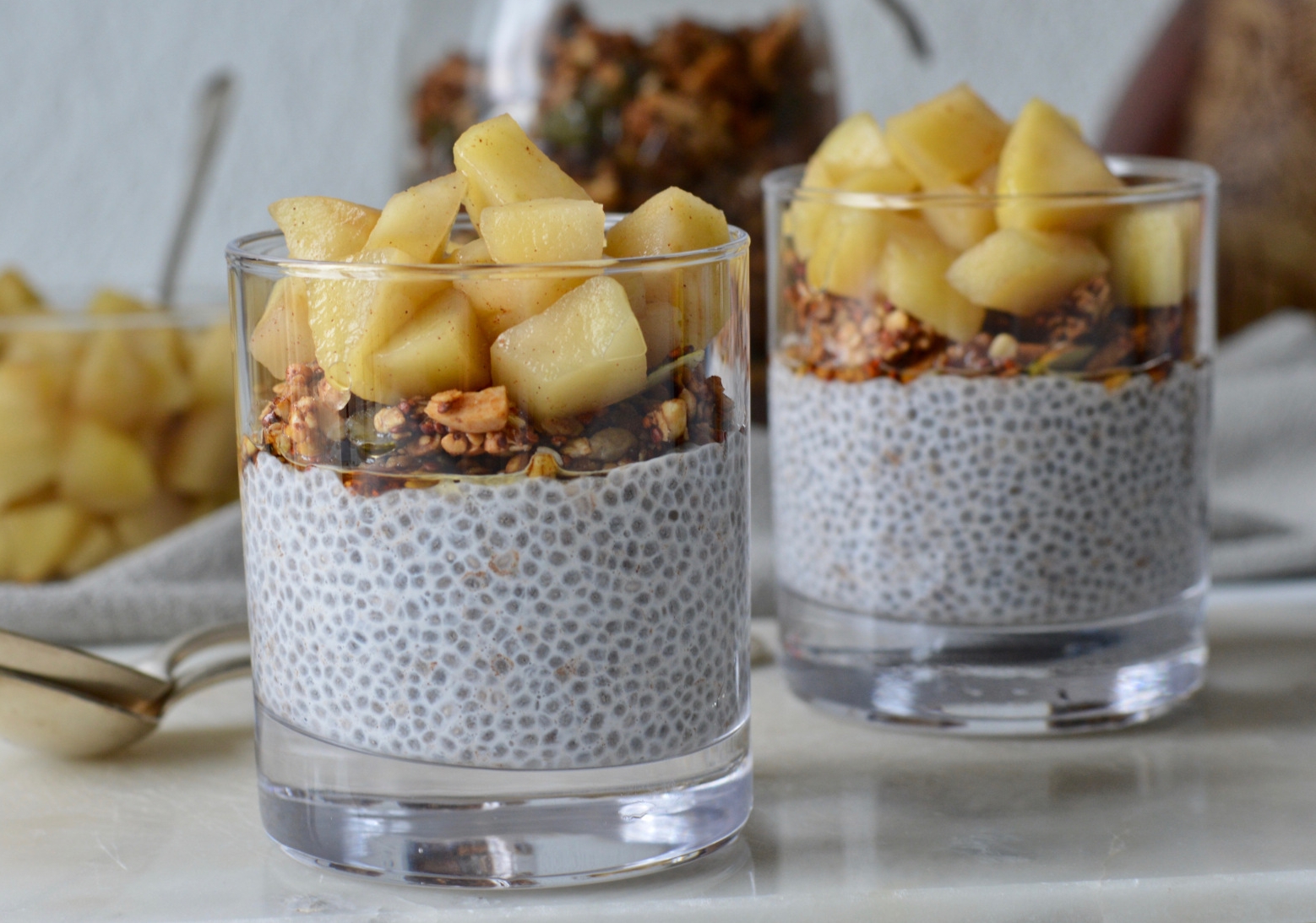 vegan apple chia puddings with homemade apple compote and granola