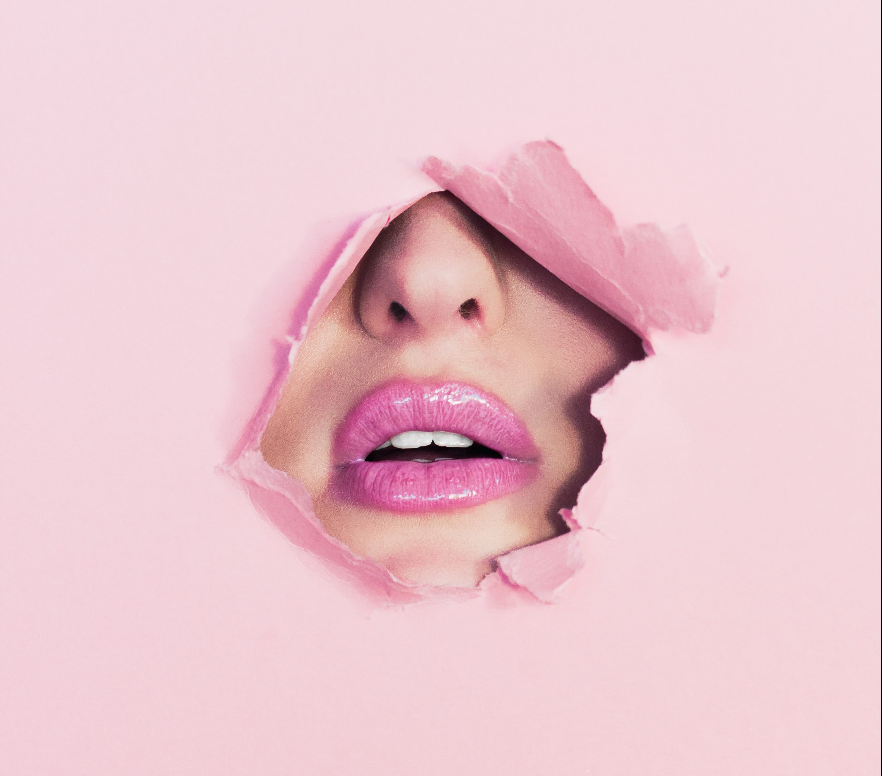 Lips Through a Pink Mask
