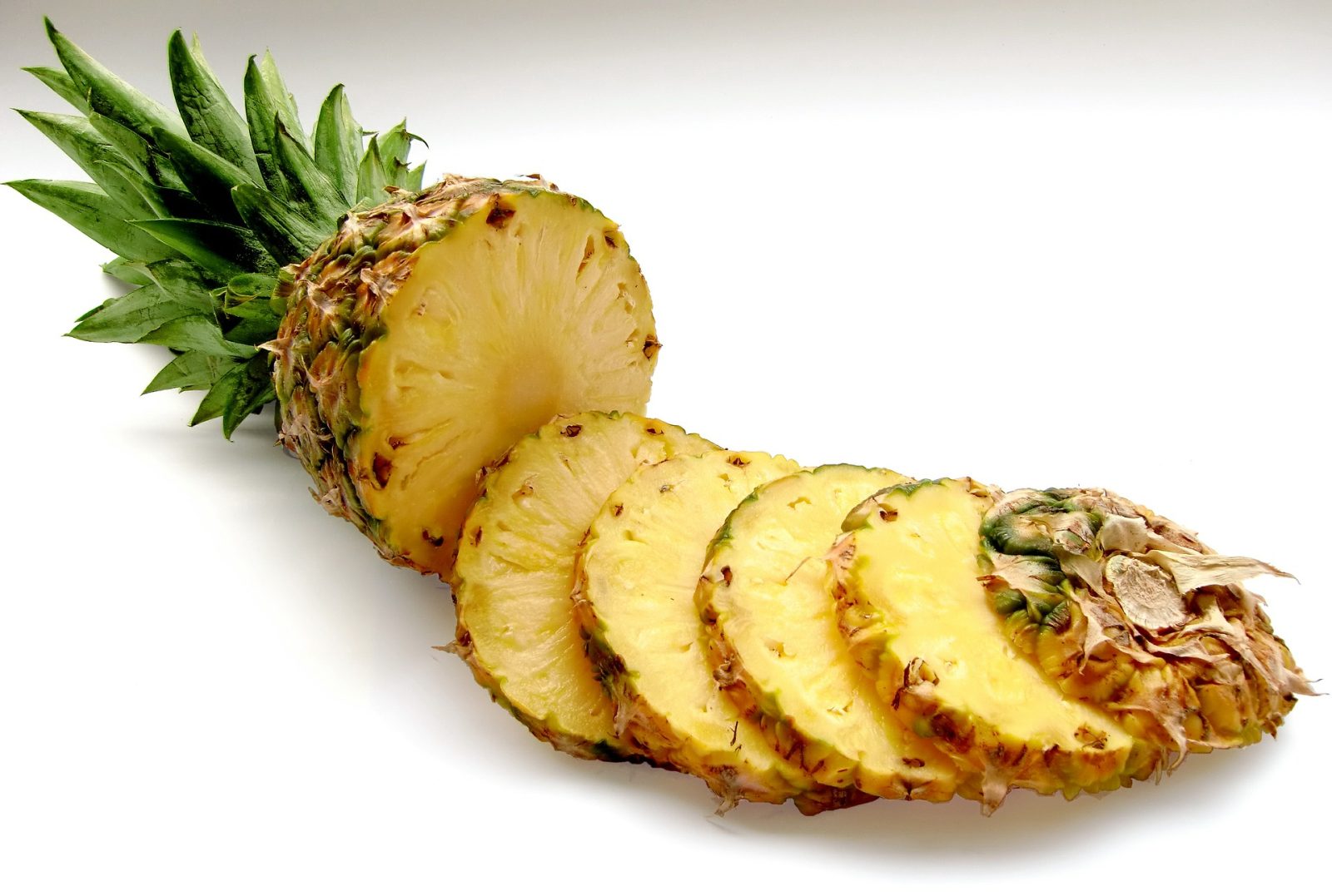pineapple cut up into round slices