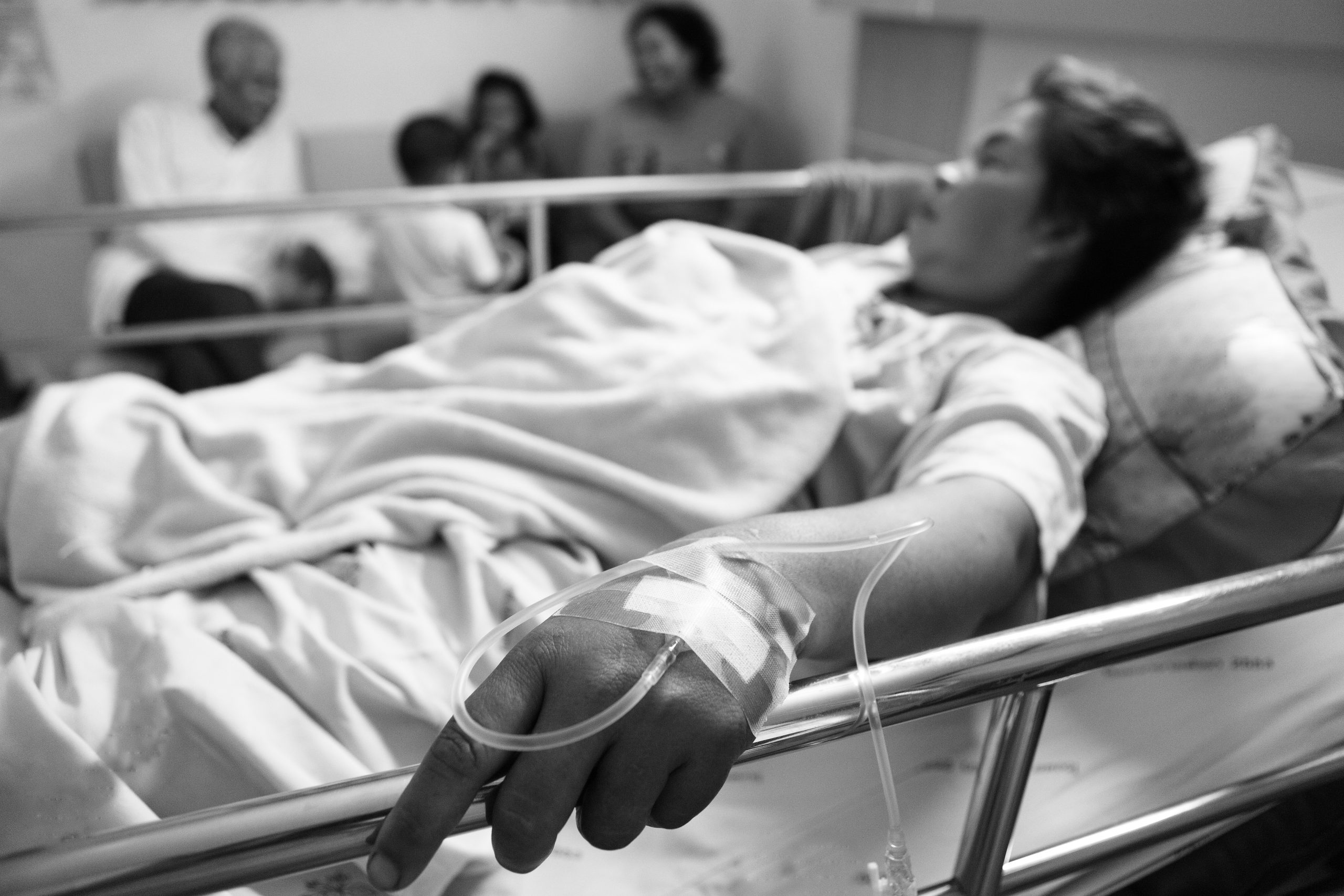 Woman lying in hospital