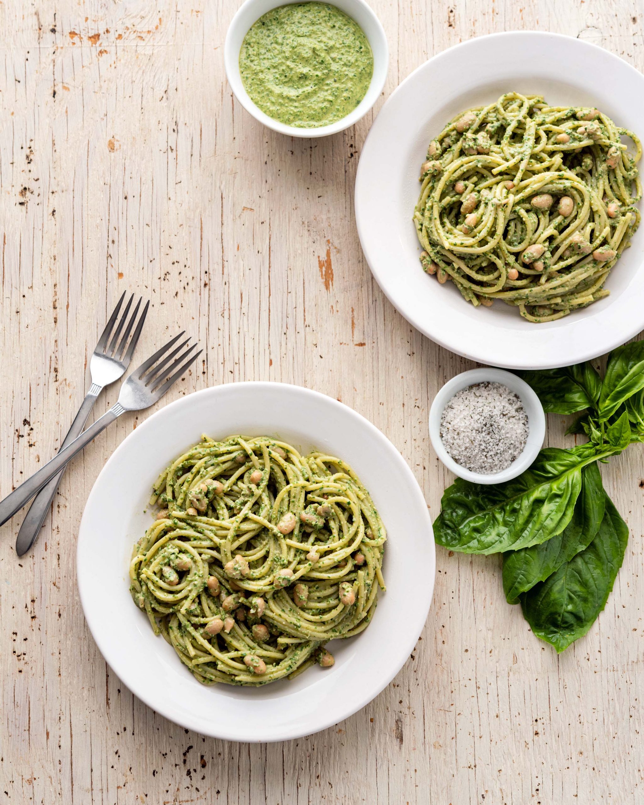 Pasta and white beans with spinach and walnut pesto