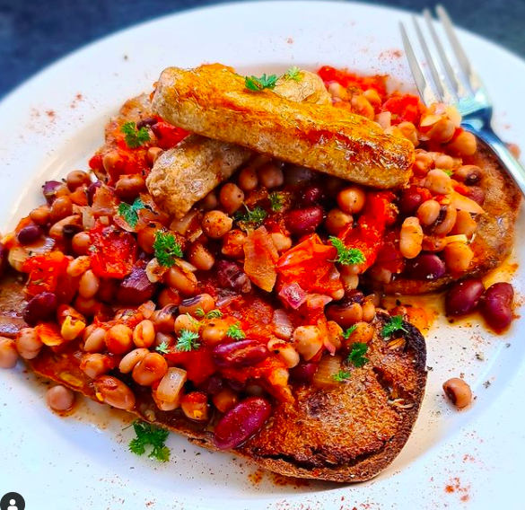 Vegan sausage and beans on toast