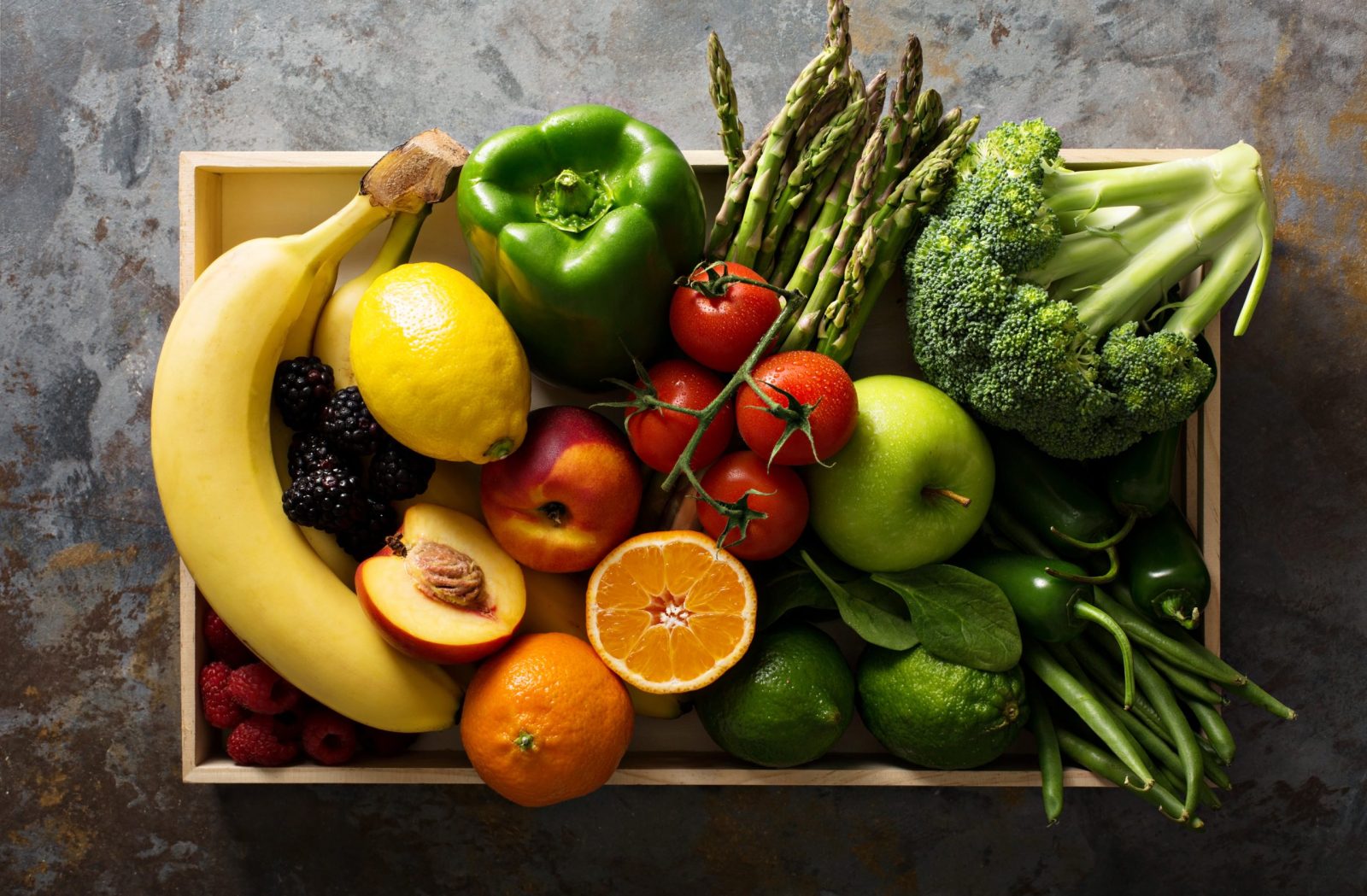 Basket of colorful fruits and vegetables