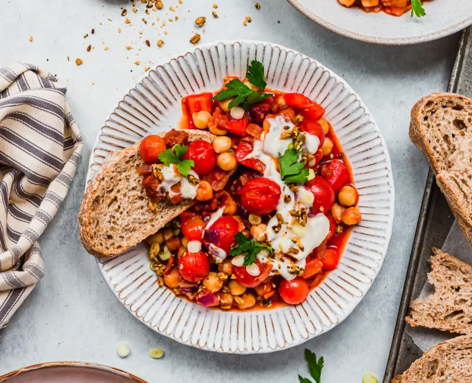 Vegan shakshuka made from chickpeas with red peppers and sun-dried tomatoes
