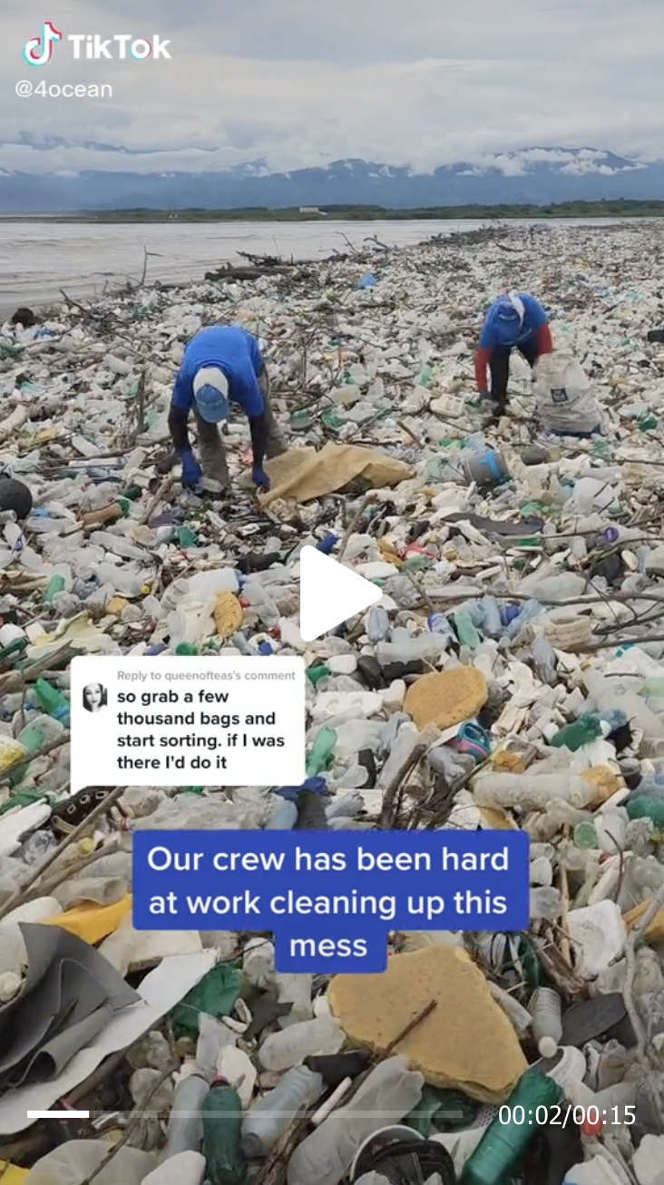 Crews cleaning up plastic waste on beach